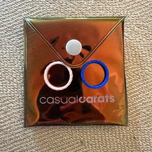 casualcarats Iridescent Pouch with Pink and Blue Rings
